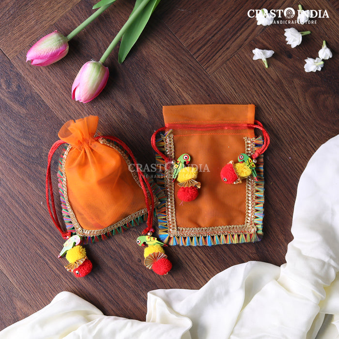 CRASTO INDIA HANDCRAFTED CLOTH POTLI WITH PARROT POM-POM LATKAN - ORANGE ( AVAILABLE IN 4 SIZES)