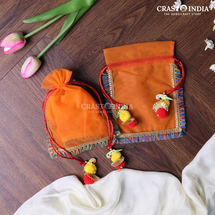 CRASTO INDIA HANDCRAFTED CLOTH POTLI WITH PARROT POM-POM LATKAN - ORANGE ( AVAILABLE IN 4 SIZES)
