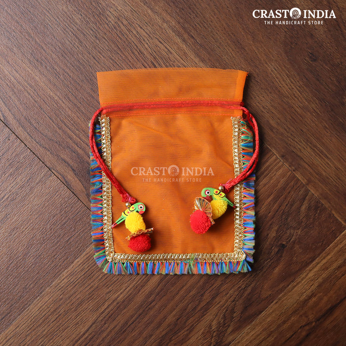 CRASTO INDIA HANDCRAFTED CLOTH POTLI WITH PARROT POM-POM LATKAN - ORANGE ( AVAILABLE IN 4 SIZES)