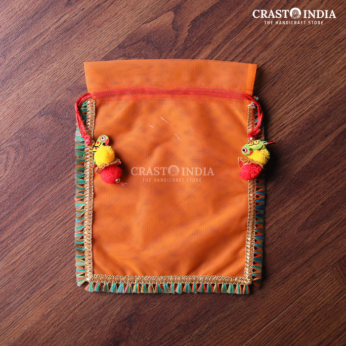 CRASTO INDIA HANDCRAFTED CLOTH POTLI WITH PARROT POM-POM LATKAN - ORANGE ( AVAILABLE IN 4 SIZES)